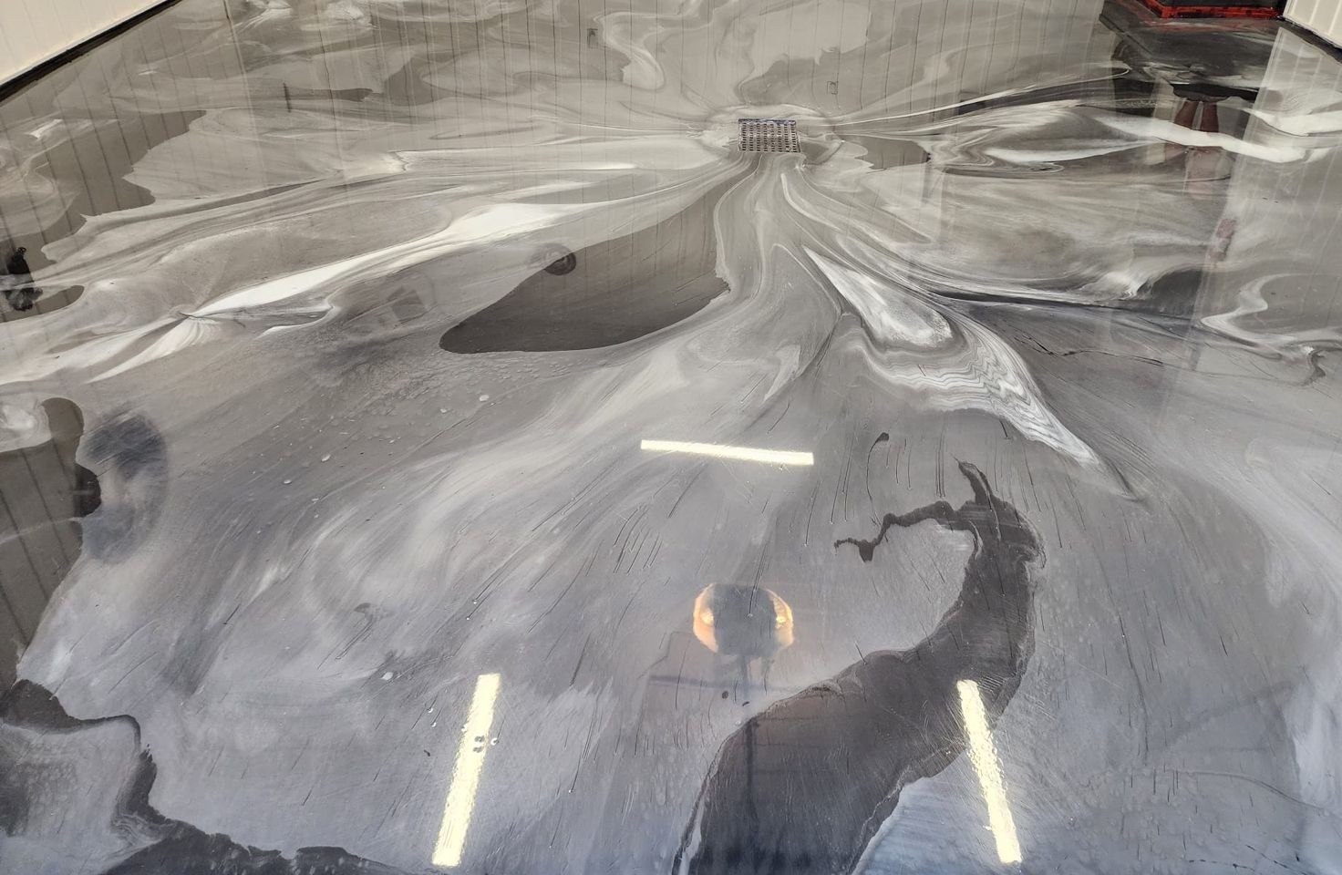 Metallic epoxy floor by Glosstek